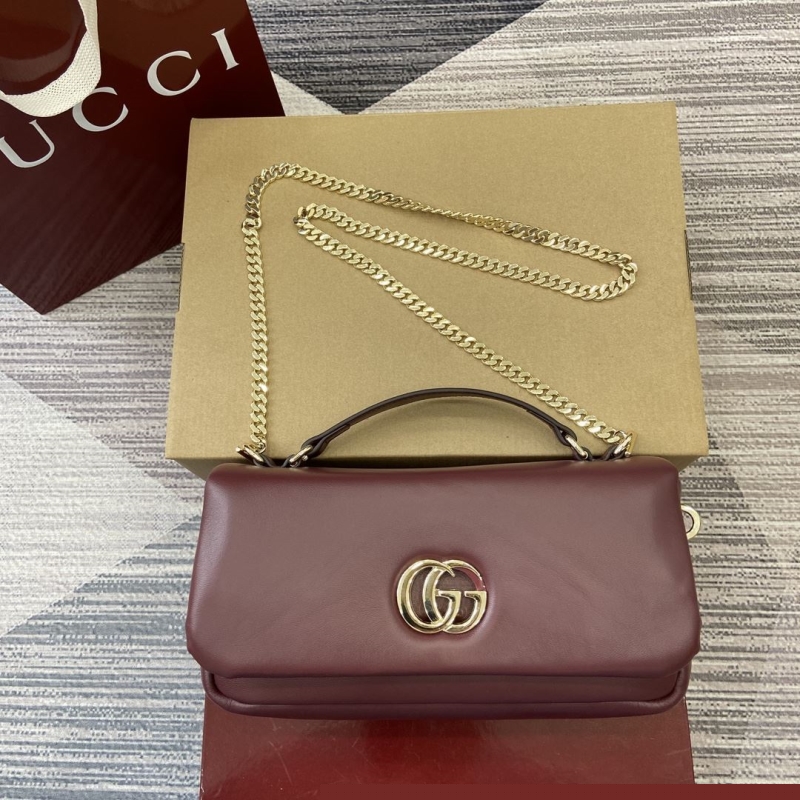 G*u*i top handle bags